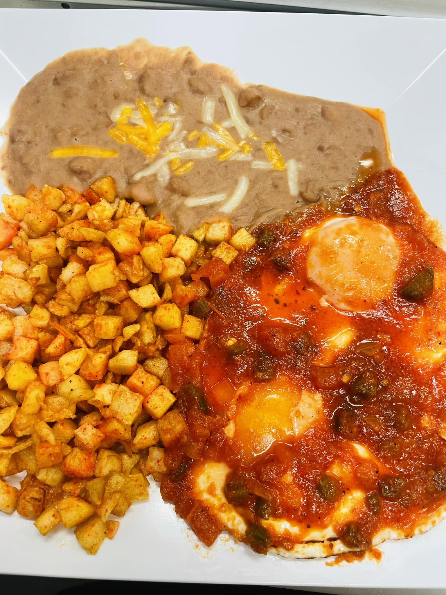 Combination plate with rice, beans and grilled meat for a company lunch order