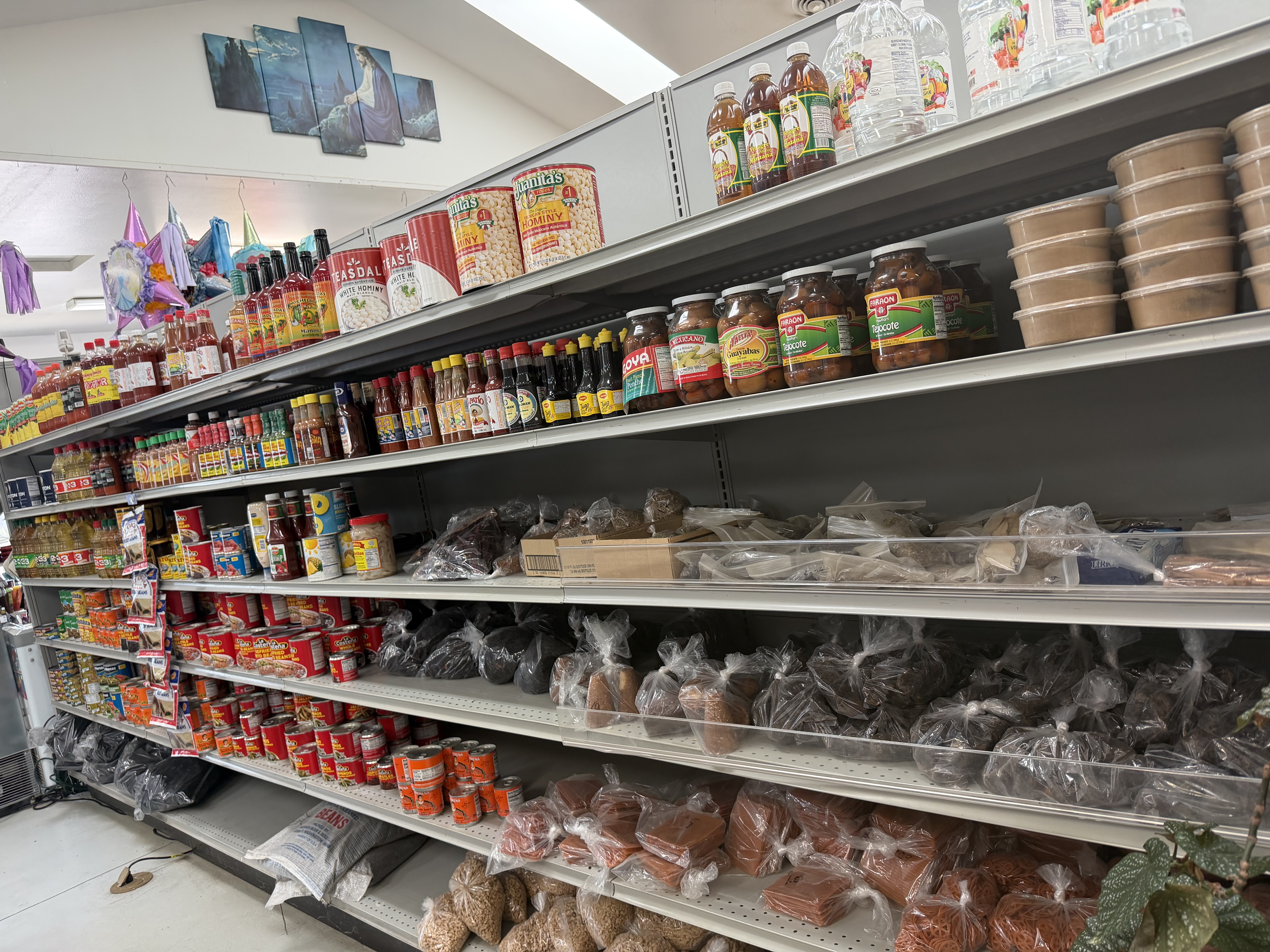 Aisle of salsas, dried chiles and Mexican pantry staples