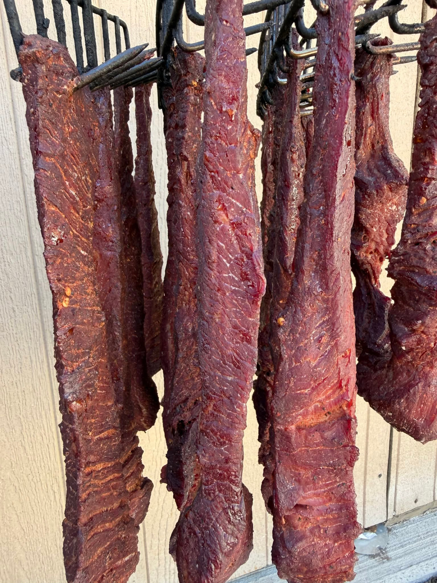 Racks of house-made carne seca at the Jake's Meats carnicería