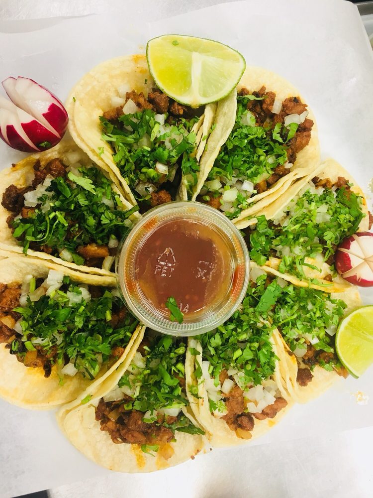 Street tacos with onion, cilantro and salsa at Jake's Meats in Quincy, WA