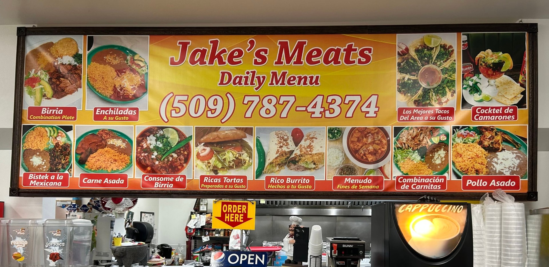 Jake's Meats daily menu banner inside the store